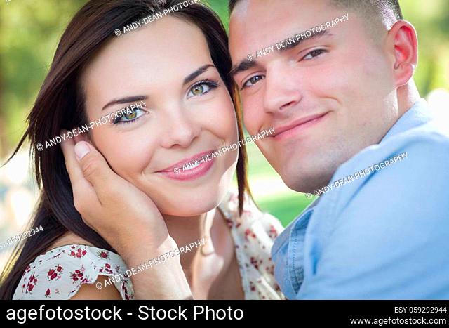Happy Mixed Race Romantic Couple Portrait in the Park