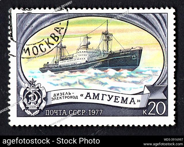 USSR - CIRCA 1977: Diesel electric ship icebreaker Amguema imaged on postage stamp. Old Soviet postage stamp dedicated to Soviet ship. Philately hobby