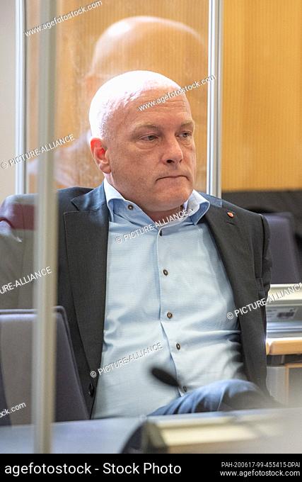 17 June 2020, Bavaria, Regensburg: Joachim Wolbergs, former mayor of Regensburg, sits in the courtroom before the verdict is announced