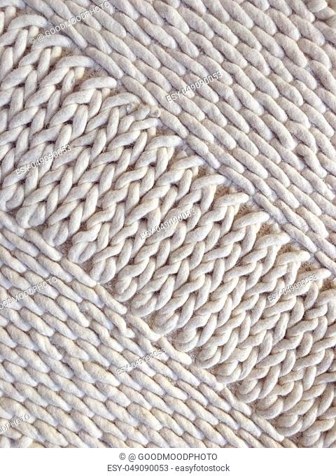 White wool handmade knitted background with simple design