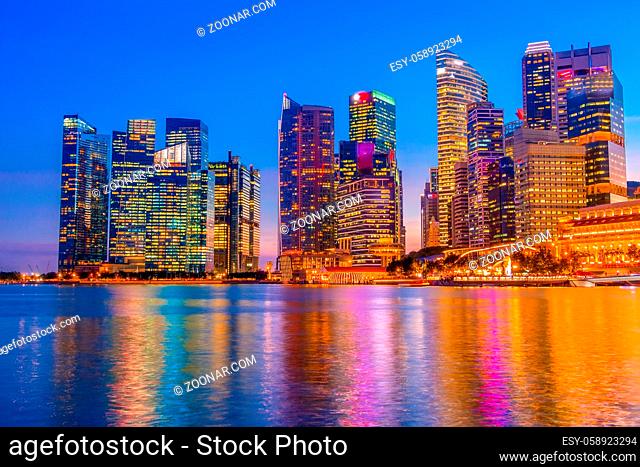 Marina Bay in Singapore. Skyscrapers and Merlion fountain