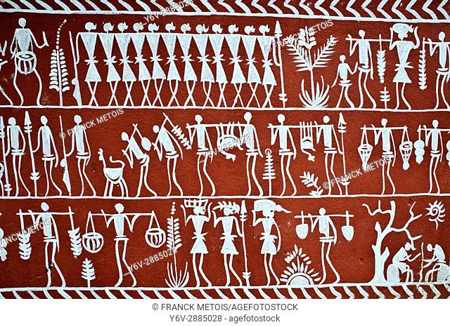 Mural painting depicting tribal people ( Rayagada, Odisha state, India). It is inspired by the Saora tribe paintings