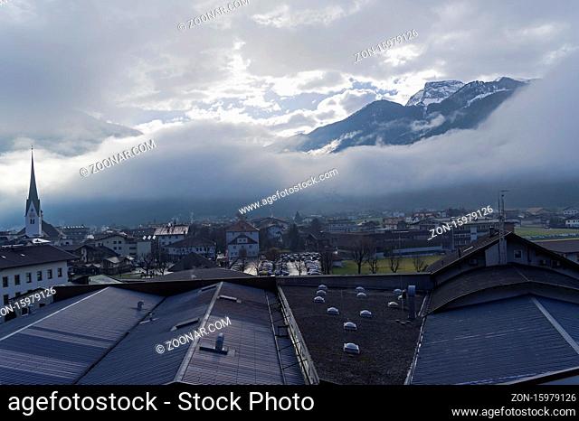 Low cloud cover the mountains. Ski resort Zell am Ziller, Ziller Valley, Tyrol, Austria. Early March