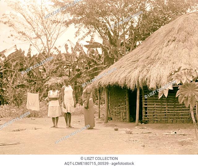 Uganda. From Hoima to Fort Portal. Hut with native young women. 1936, Uganda