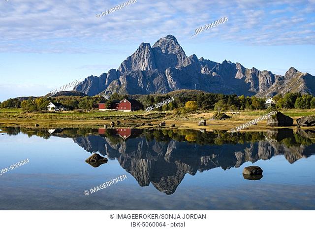 Autumnal landscape, water reflection with mountain, near Svolvaer, Lofoten, Norway, Europe