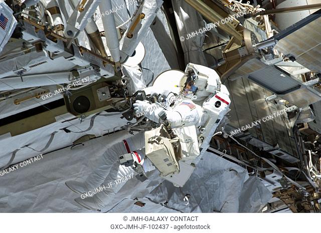 Expedition 35 Flight Engineers Chris Cassidy (pictured) and Tom Marshburn (out of frame) completed a space walk at 2:14 p.m