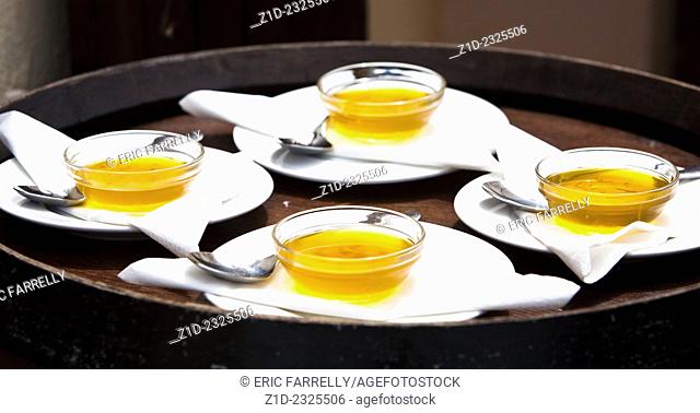 Restaurant Alghero, Sardinia, Italy with olive oil prepared for tables
