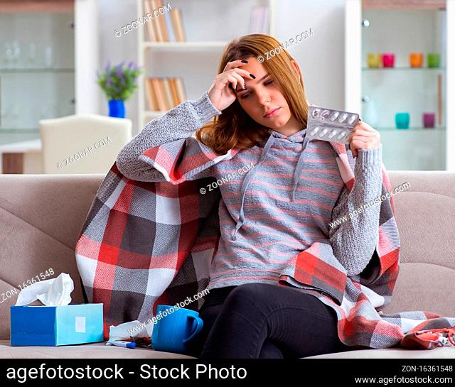 The sick woman suffering from flu at home
