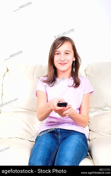 Girl with TV remote control