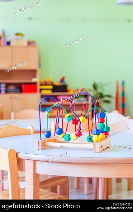 Close up of colorful wooden toy for learning and socialization