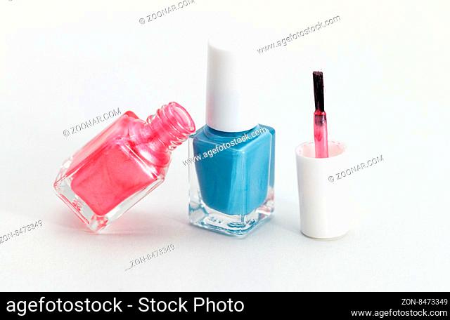 Colorful nail polish - white background, blue and pink style