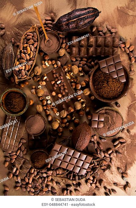 Milk and dark chocolate on a natural paper background