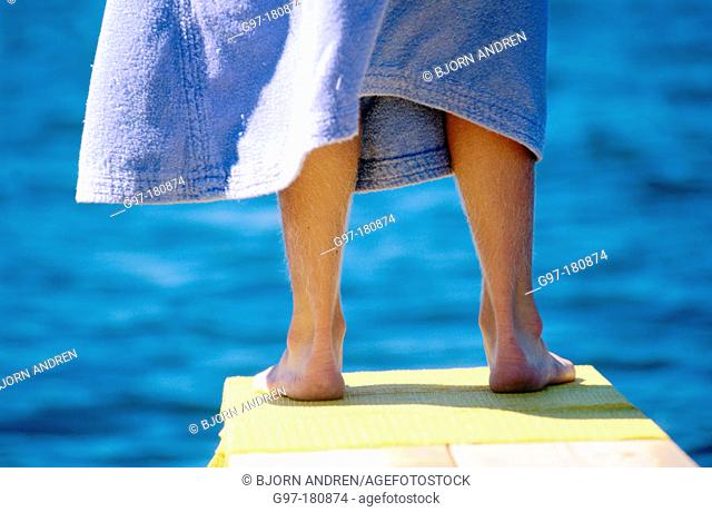 Child's legs on springboard