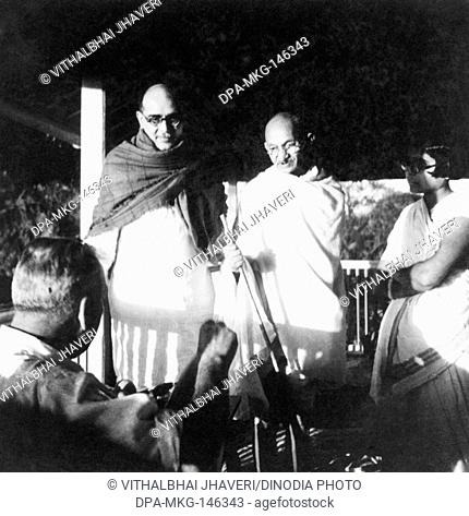Dr. Hermann Kallenbach ; Mahadev Desai ; Mahatma Gandhi and an ashramite at Bardoli ; 1939 ; India NO MR
