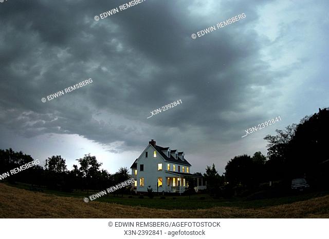 Rain storm over farm house, Maryland