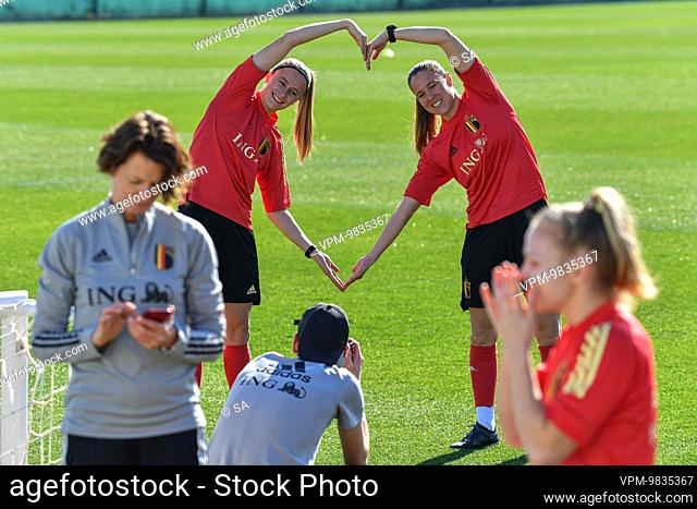 Belgium's Julie Biesmans and Belgium's Lenie Onzia make a heart for the camera on Valentinesday during a winter training camp of Belgium's national women's...