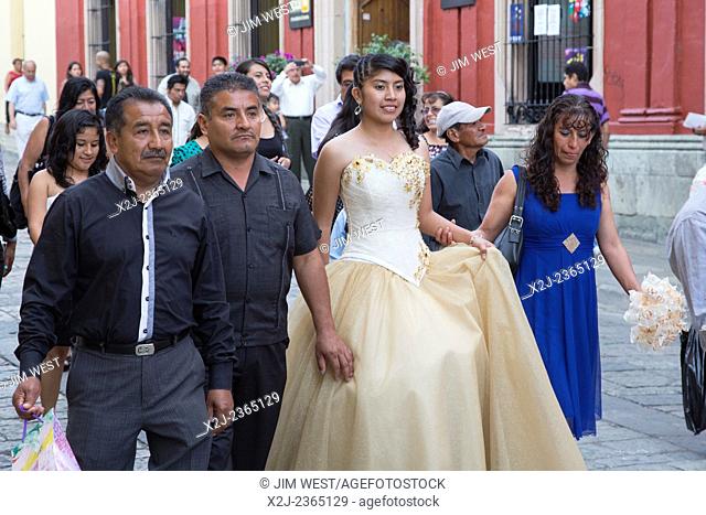 Oaxaca, Mexico - A quinceañera celebration. The girl celebrating her 15th birthday marches with her..., Stock Photo, Picture And Rights Managed Image. Pic. X2J-2365129