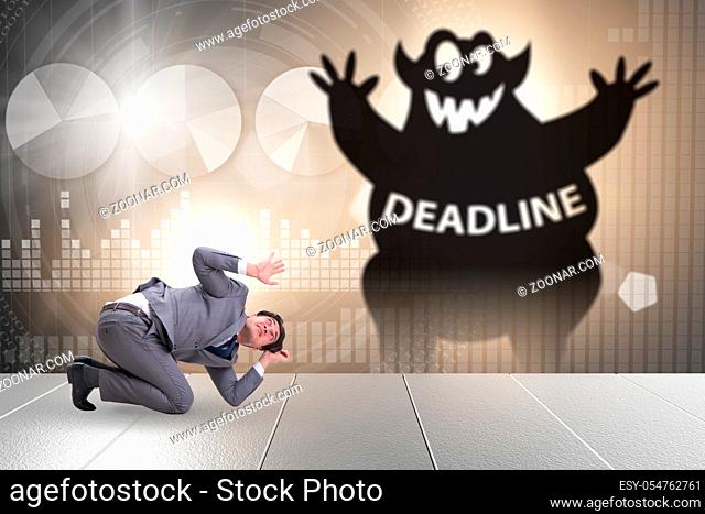 Businessman missing important deadline with the monster