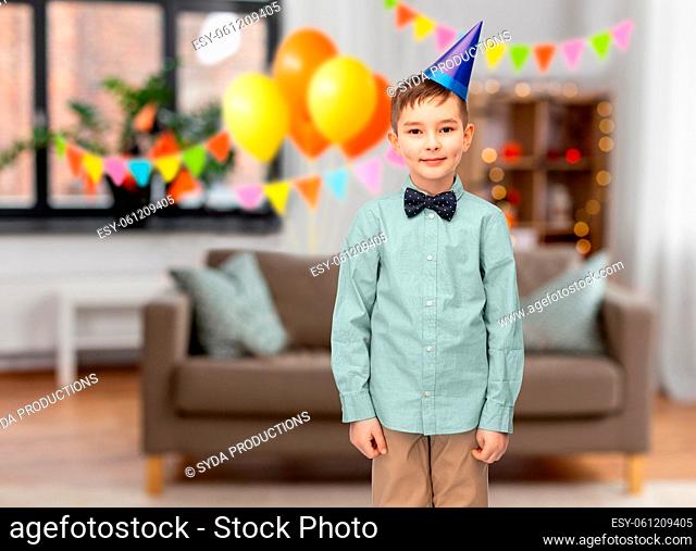 smiling little boy at birthday party at home