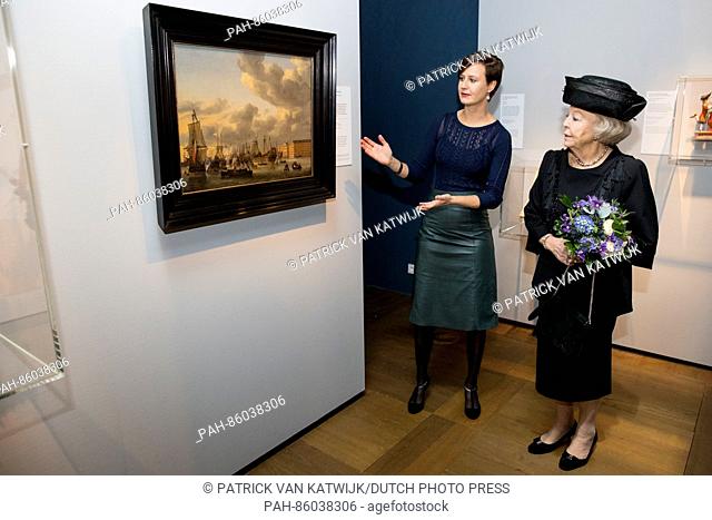 Princess Beatrix of The Netherlands at the painting Gezicht op't IJ met Lands Zeemagazijn from Reinier Nooms and the ship Huis Tijdverdrijf during her visit to...