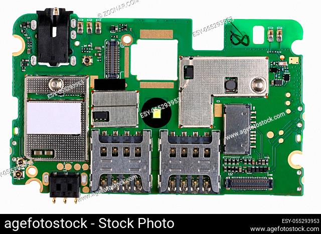 Printed circuit board of a mass production electronic device with memory card slots and audio video sockets. Isolated on white studio macro shot