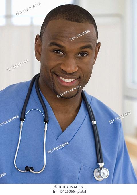 Portrait of male doctor with stethoscope around neck