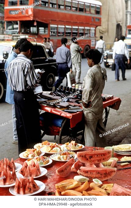 fruits slices sold on the roadside fruitstall ; mumbai bombay ; maharashtra ; india