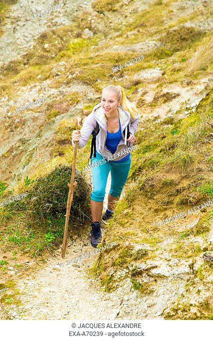 Woman hiking in mountain