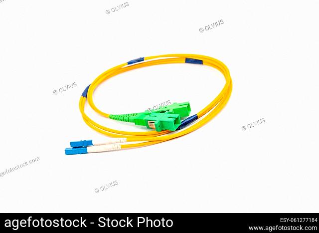 Yellow fiber optic cables isolated on white background