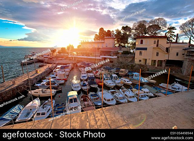 Town of Lovran waterfront and harbor sunset view, Opatija riviera of Croatia
