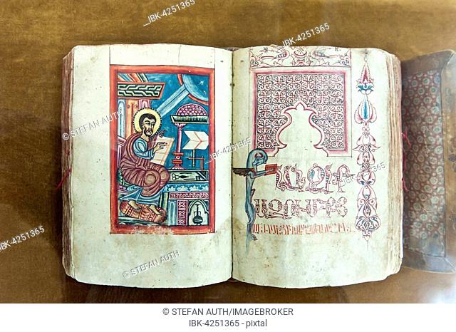 Armenian Apostolic Church, old bible, painted Evangelist, Armenian script, open book at the museum, Vank Cathedral, Jolfa or New Julfa, Isfahan, Iran
