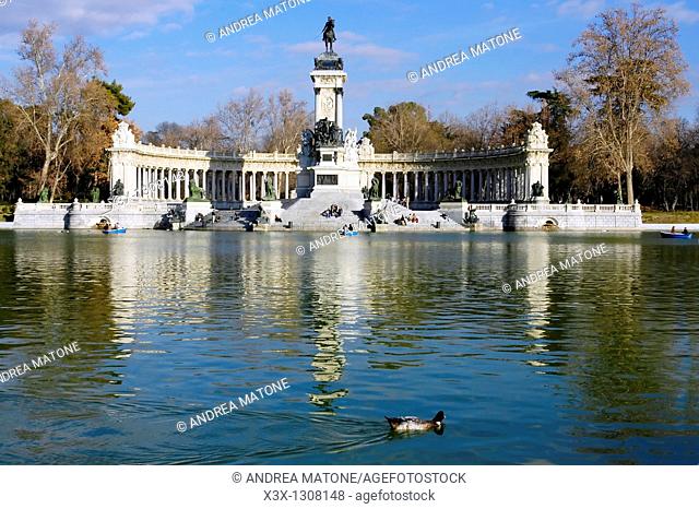 The lake in El Retiro park leading to the monument of Alfonso XII Spain Madrid