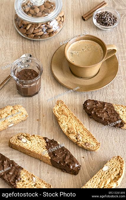 Italian almond cookies cantucci with dark chocolate and coffee