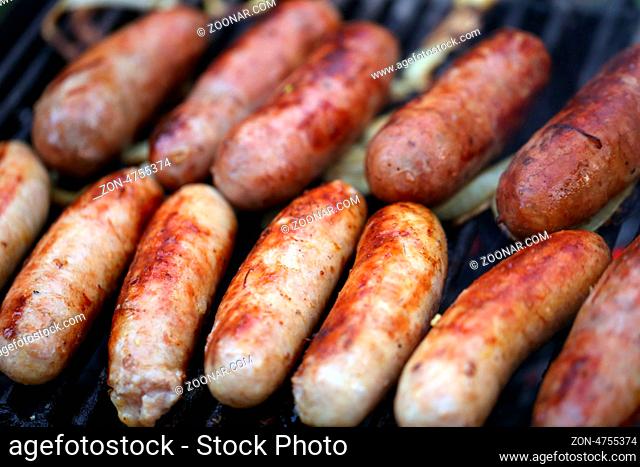 A lot of grilled sausages close up, barbecue