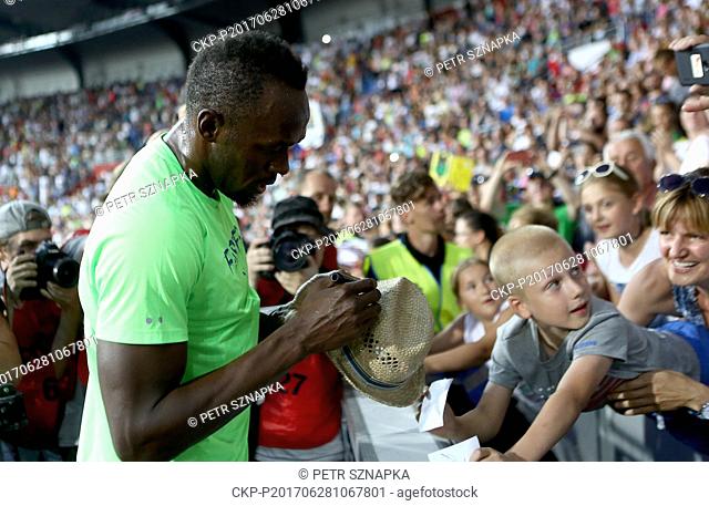 Jamaican sprinter Usain Bolt signs to audience during the Golden Spike Ostrava athletic meeting in Ostrava, Czech Republic, on June 28, 2017