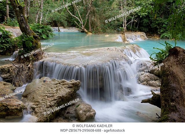 The cascades and turquoise blue pools of the Kuang Si Falls near Luang Prabang in Laos