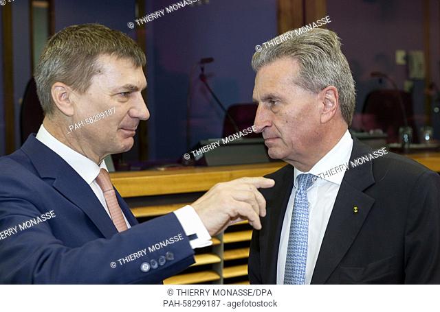 Brussels, Belgium, May 6, 2015. -- EU Digital Single Market Commissioner Andrus Ansip (L) is talking with the EU Digital Economy & Society Commissioner Günther...