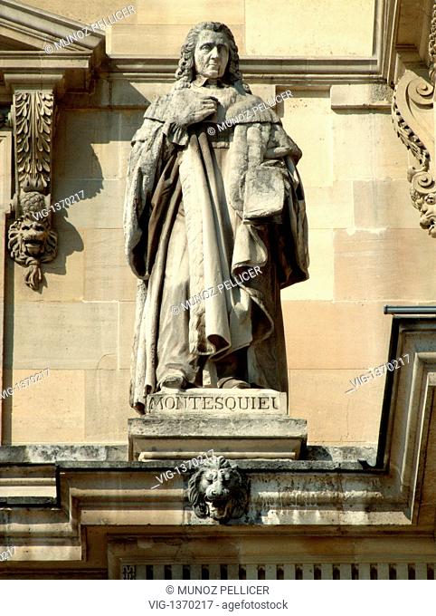 FRANCE, PARIS, 01.05.2007, Statue of french political philosopher Charles-Louis de Secondat, baron de La Brede et de MONTESQUIEU at the facade of The Louvre...
