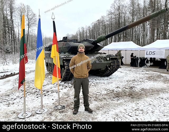 15 December 2023, Lithuania, Rukla: Sebastian Dietz, Head of Lithuania Defense Services (LDS), stands in front of a Leopard 2 A6 tank at the Lithuanian...