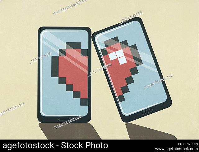 Pixelated broken heart on smart phone screens