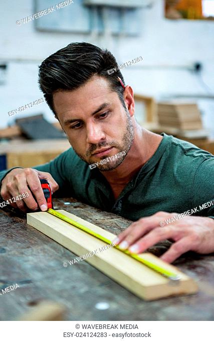 Carpenter working on his craft