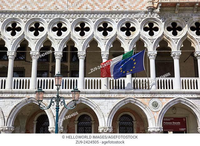 Italian and European flags flying on the Palazzo Ducale, Piazza San Marco, Venice, Veneto, Italy, Europe