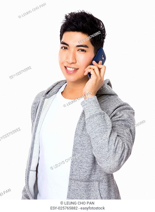 Asian man talk to cellphone