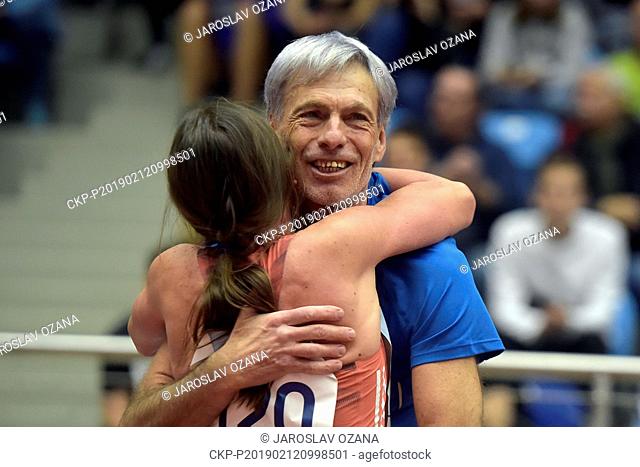 The second placed Simona Vrzalova (CZE) embraces her coach Augustin Sulc after the women's 1.500 m race within the Czech Indoor Gala