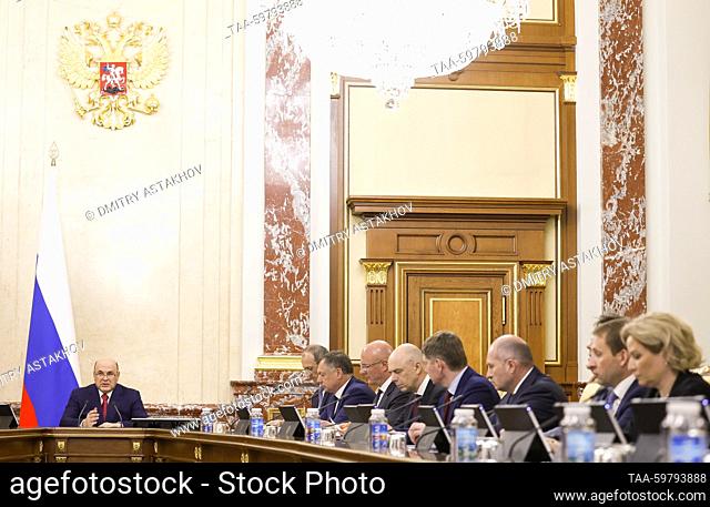 RUSSIA, MOSCOW - JUNE 13, 2023: Russia's Prime Minister Mikhail Mishustin (L) chairs a meeting of Russian government officials at the House of the Russian...