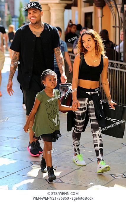 Chris Brown seen with girlfriend Karrueche Tran and friends at The Grove. They lunched at La Piazza Ristorante then headed for Nordstrom's to shop before...