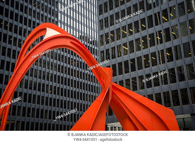 Flamingo sculpture by Alexander Calder, is a stabile located in the Federal Plaza in front of the Kluczynski Federal Building, Chicago, Illinois, USA