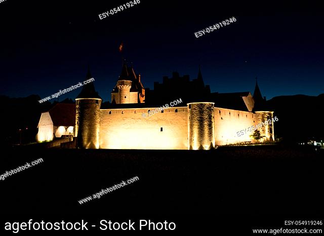 Aigle, VD / Switzerland - 31 May 2019: the historic castle at Aigle in the Swiss canton of Vaud at night