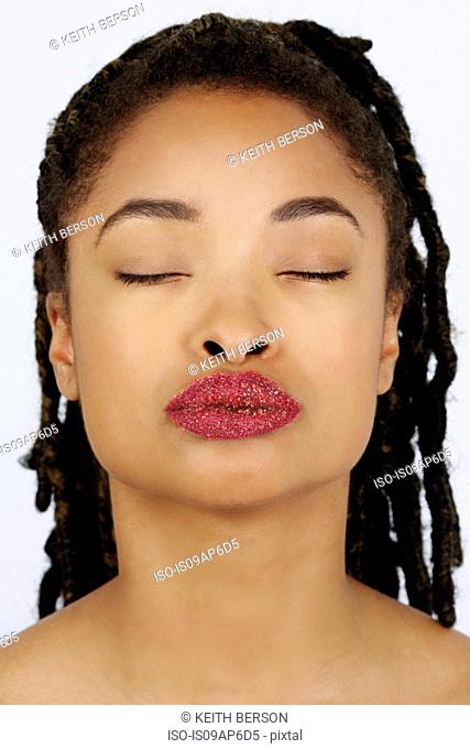 Woman with lips covered in sugar