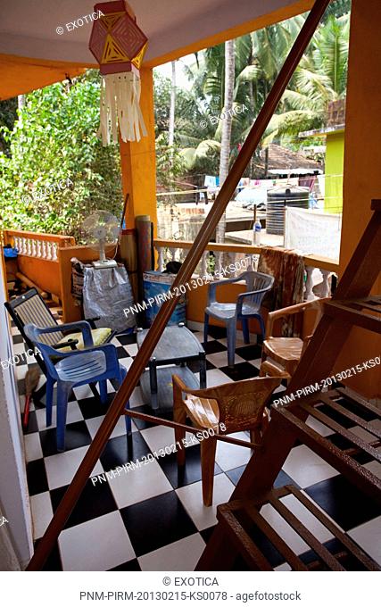 Table and chairs in the balcony of a yoga centre, Reiki Centre, Arambol, North Goa, Goa, India
